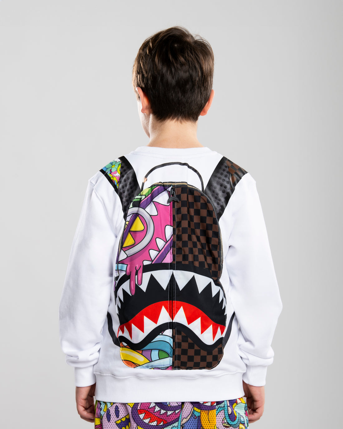 LUCID DREAMS JELLY WORLD FIXES BACKPACK IN THE CREWNECK
