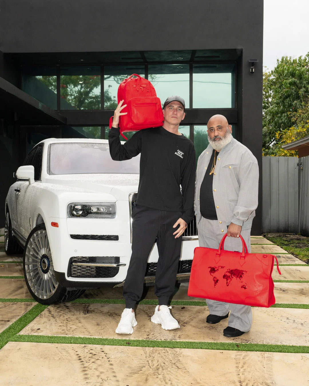 JAMES GLOBAL RED PYRAMID LARGE DUFFLE