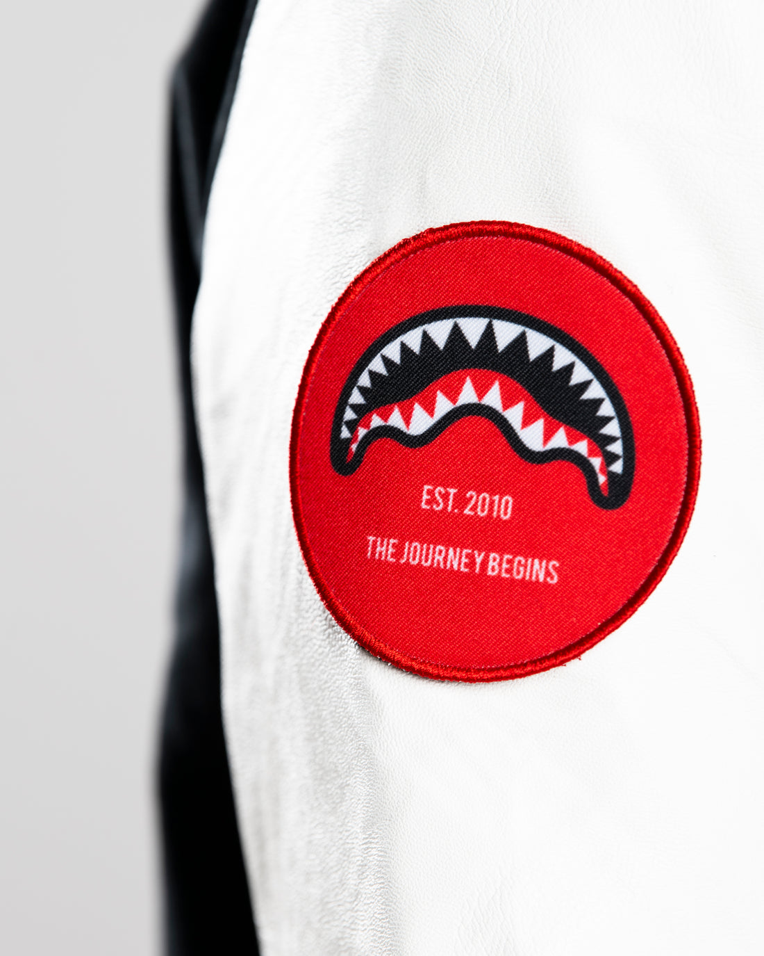 DETACH AND STICK IT VARSITY JACKET