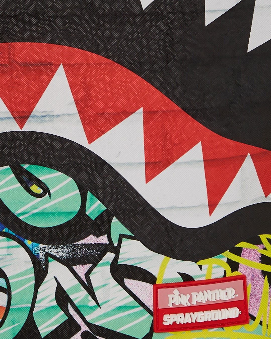 PINK PANTHER PAINTING OVER GRAFFITI DLXR BACKPACK