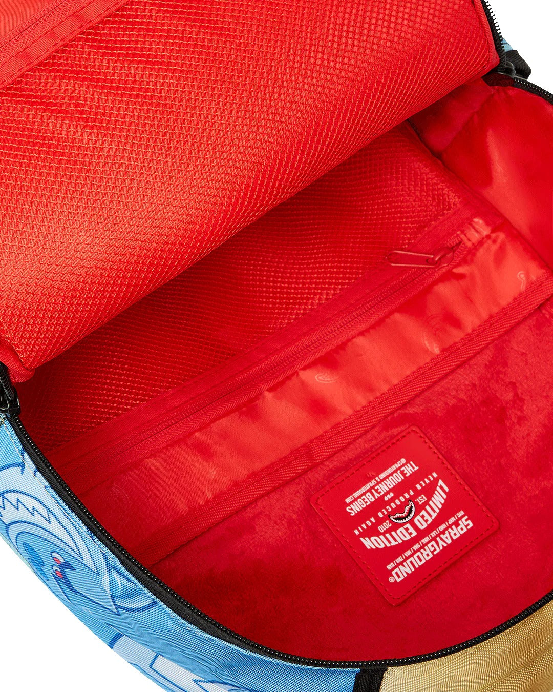 TIMMY SITTING ON MONEY CHAIR BACKPACK